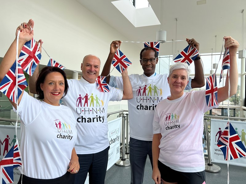 Colleagues from across UHNM with union jack flags 