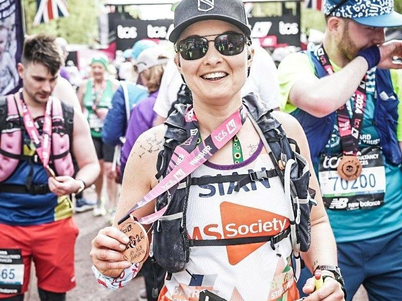 Sian Fern, a senior sister on the Critical Care Unit with marathon medal 