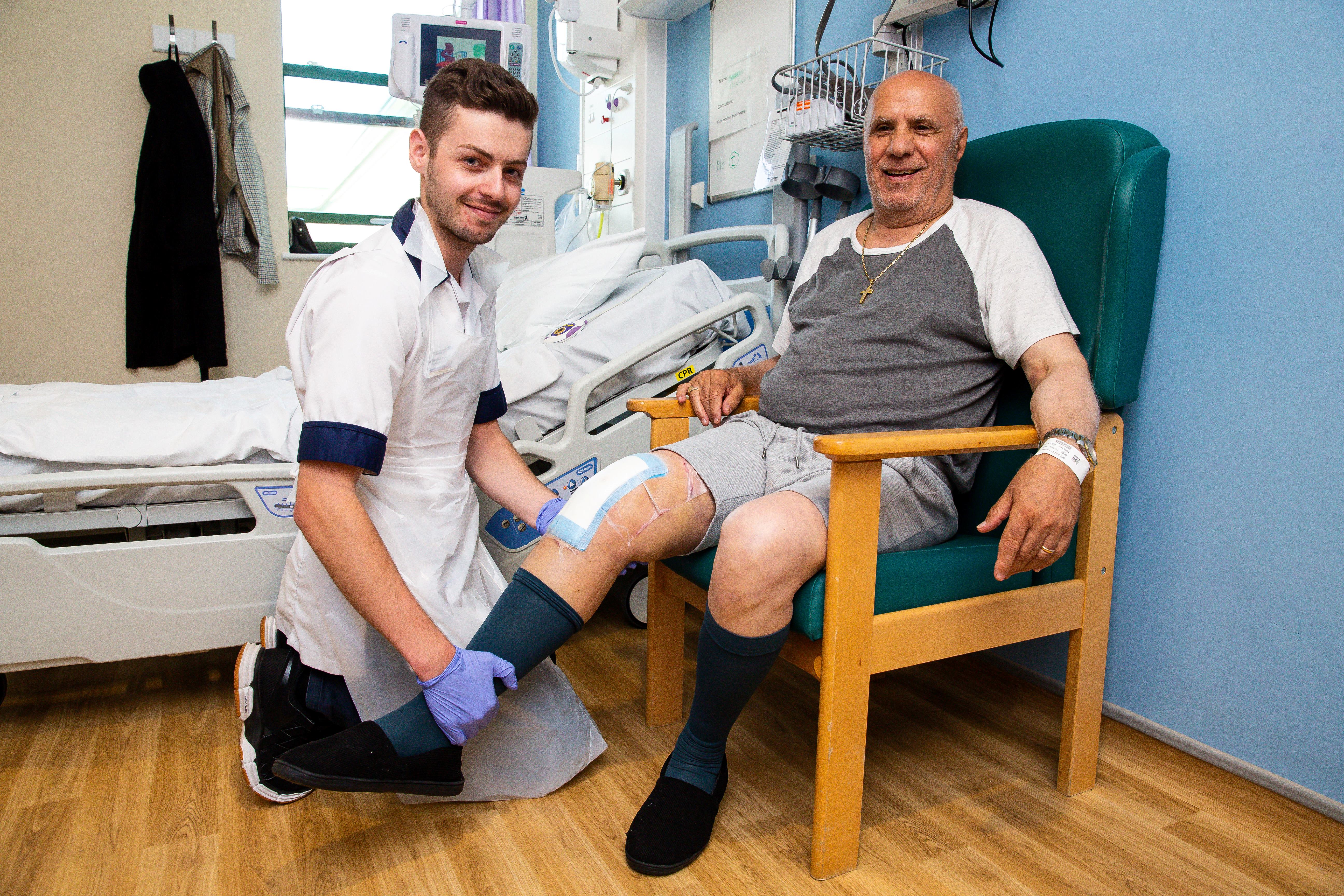 Physio working with patient after knee surgery