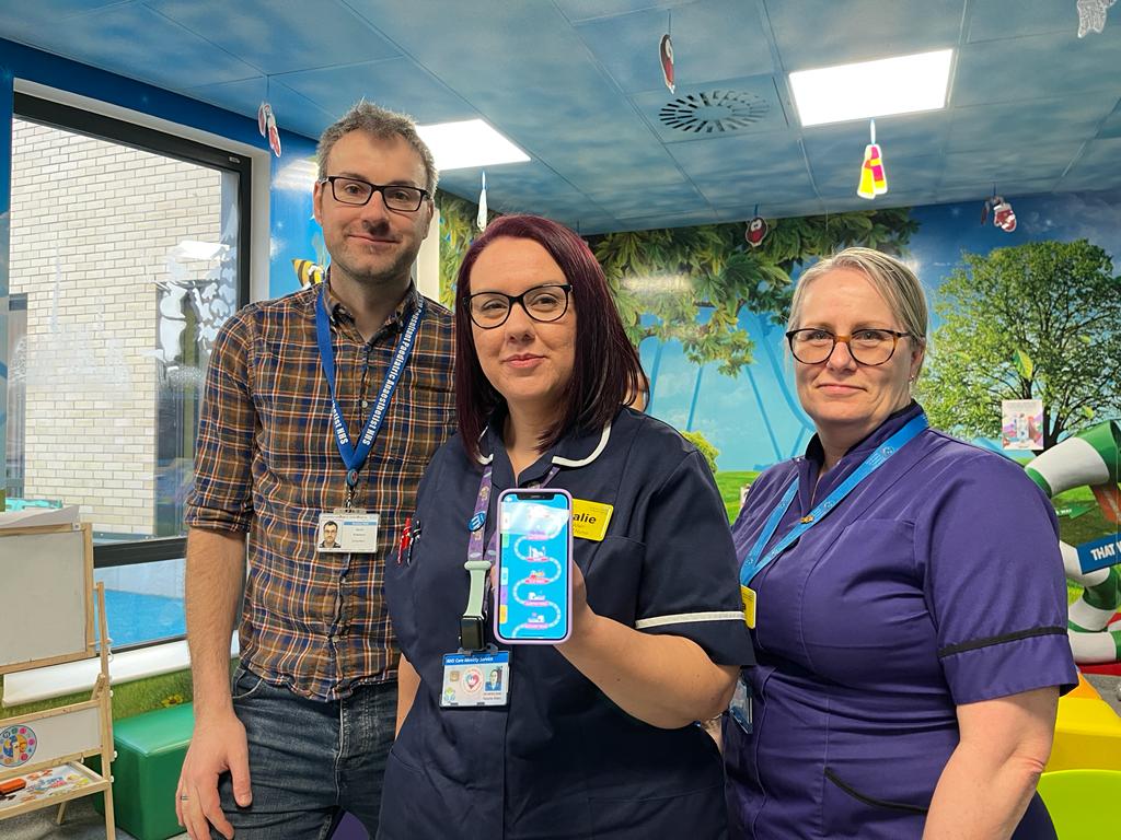 Child Health staff with app open